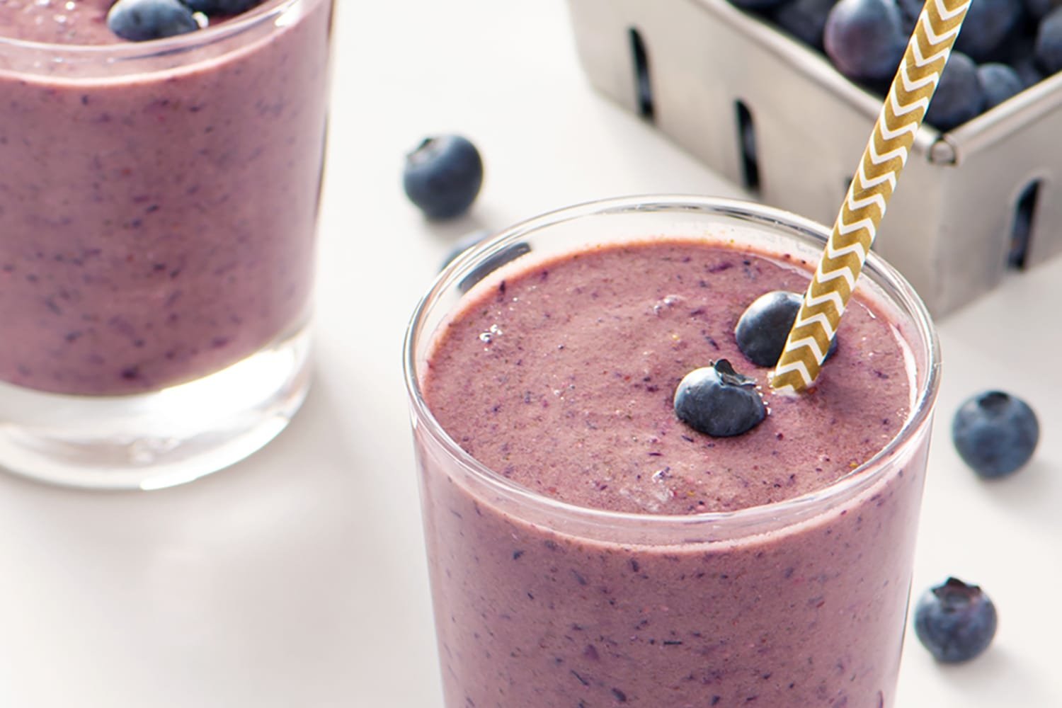 Anti-aging smoothie topped with vibrant pomegranate seeds for glowing skin and heart health