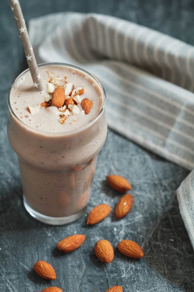 Youthful smoothie with creamy almond butter and almonds, packed with vitamin E and healthy fats