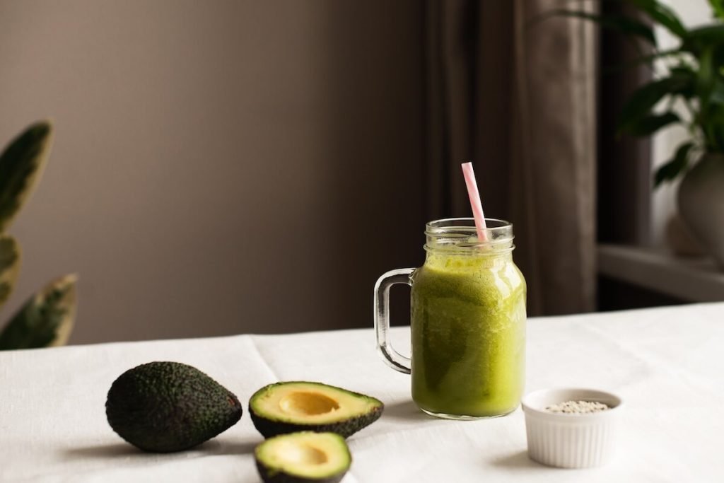 Avocado smoothie rich in healthy fats and vitamin E for glowing, youthful skin