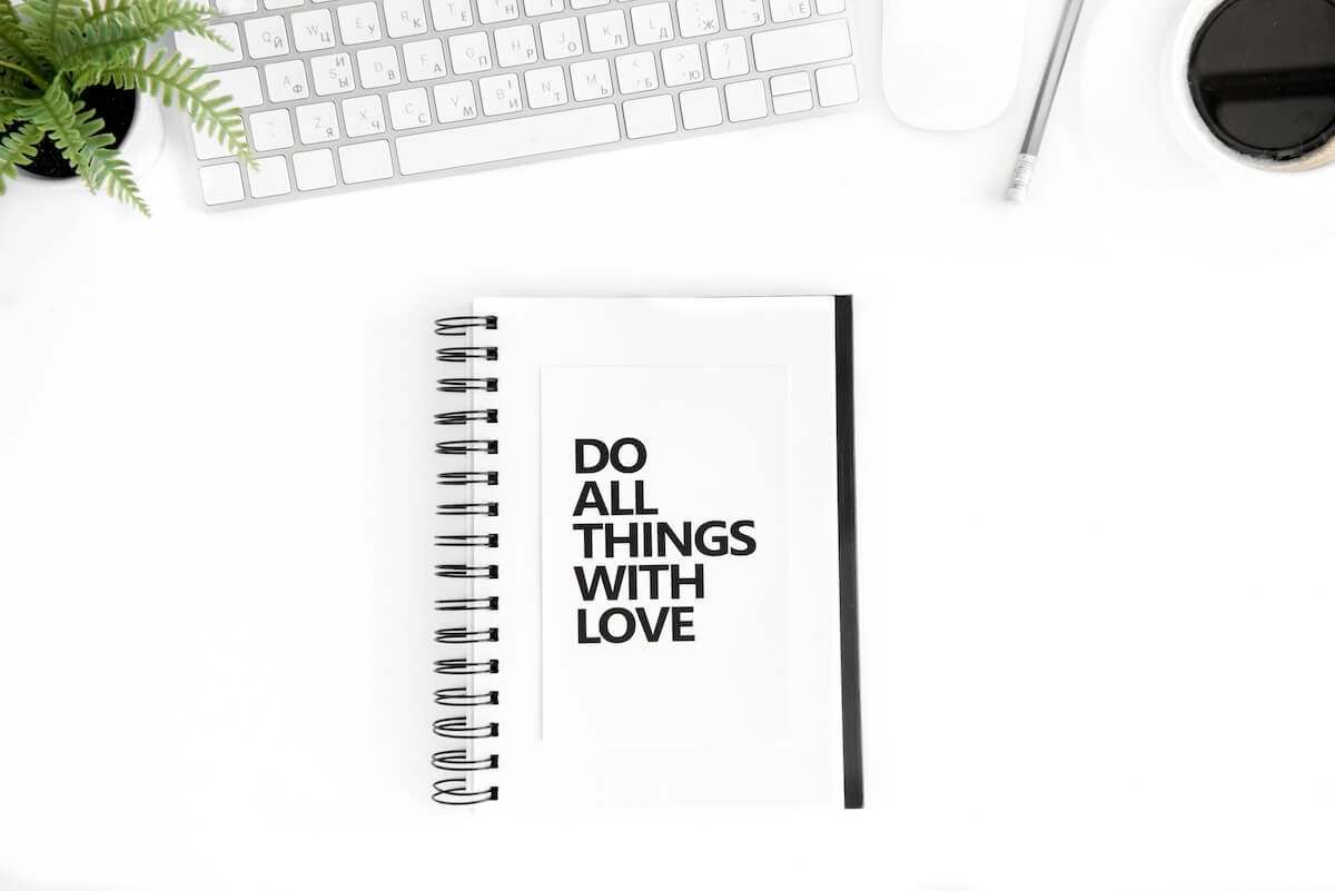 Notebook with an inspirational Christian message on the cover.