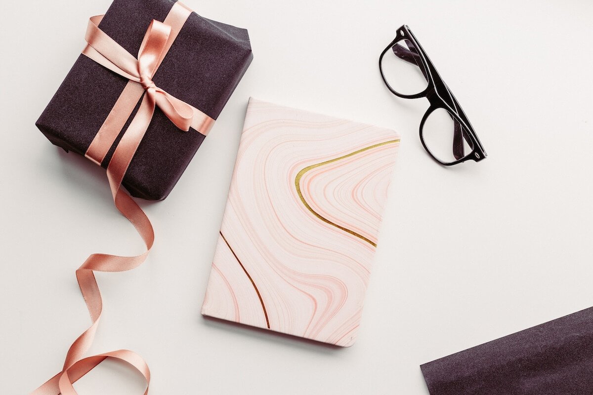 Stylish planner or wall calendar as an affordable organization gift.