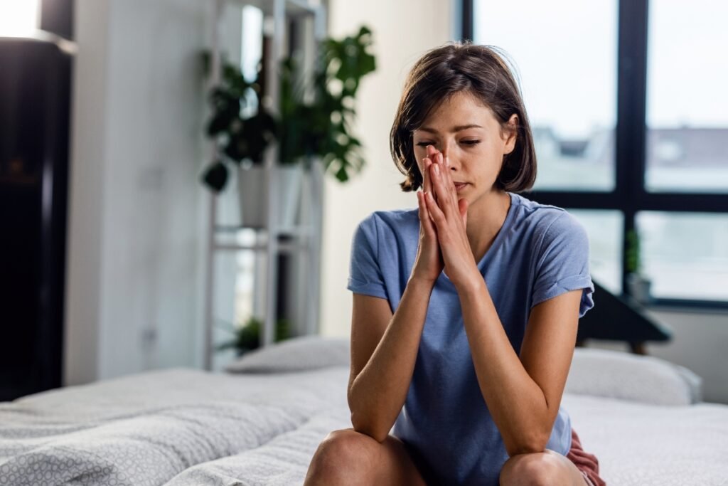 Woman feeling overwhelmed.