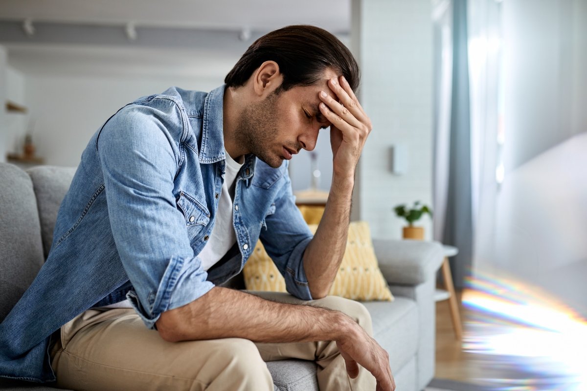 Man struggling with depression and emotional stress.