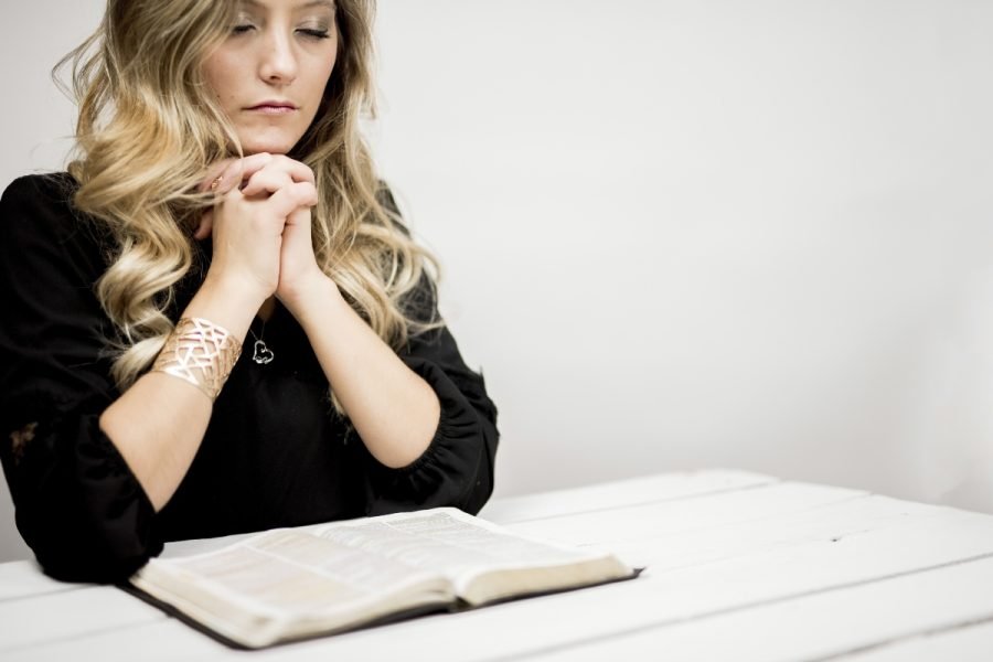 Woman in prayer and reflection